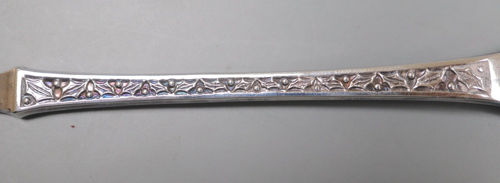A cased set of six silver teaspoons and two single Christmas spoons
